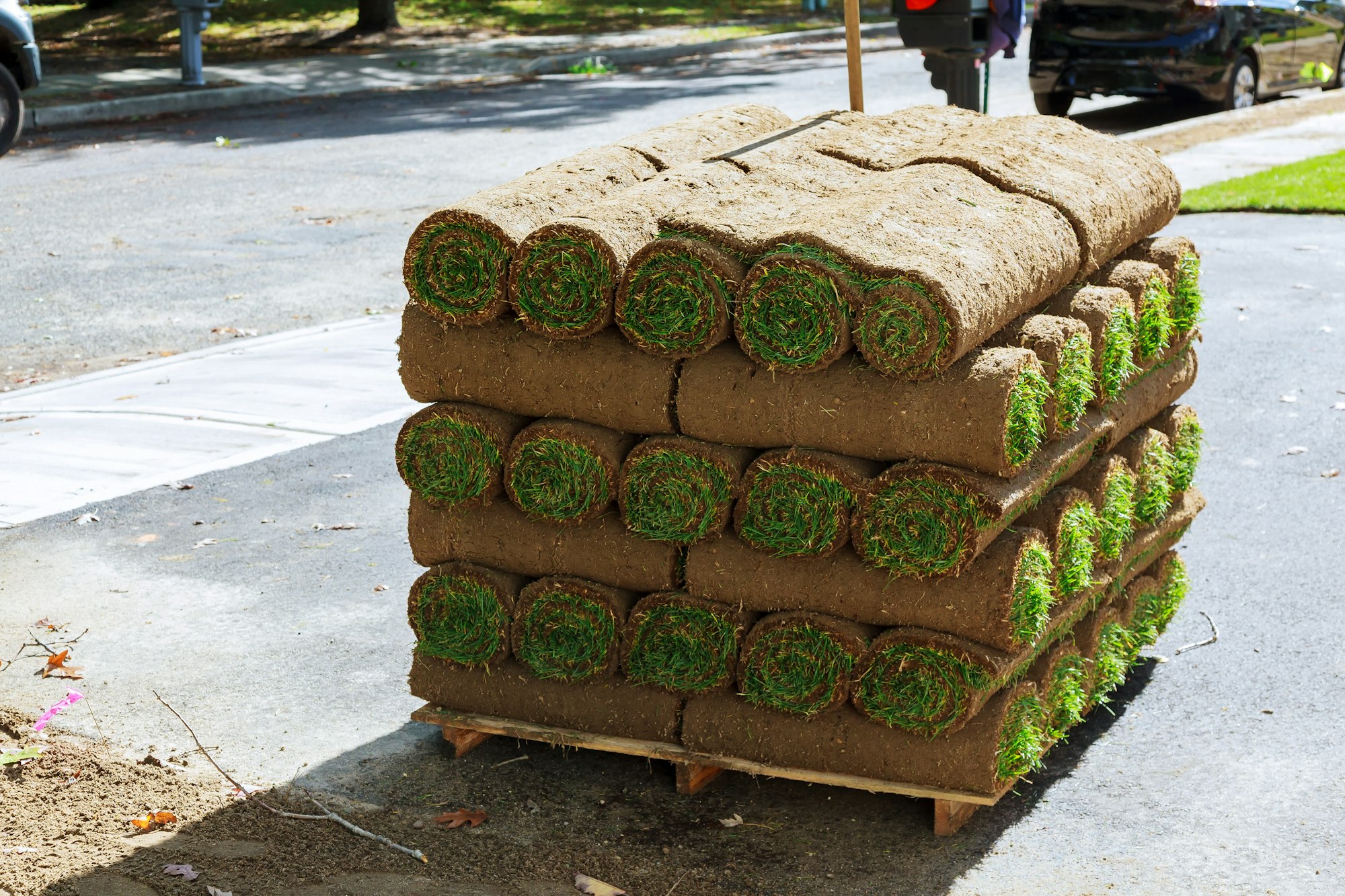 stacks Grass turf in rolls ready to be used for gardening or landscaping of sod rolls for new lawn